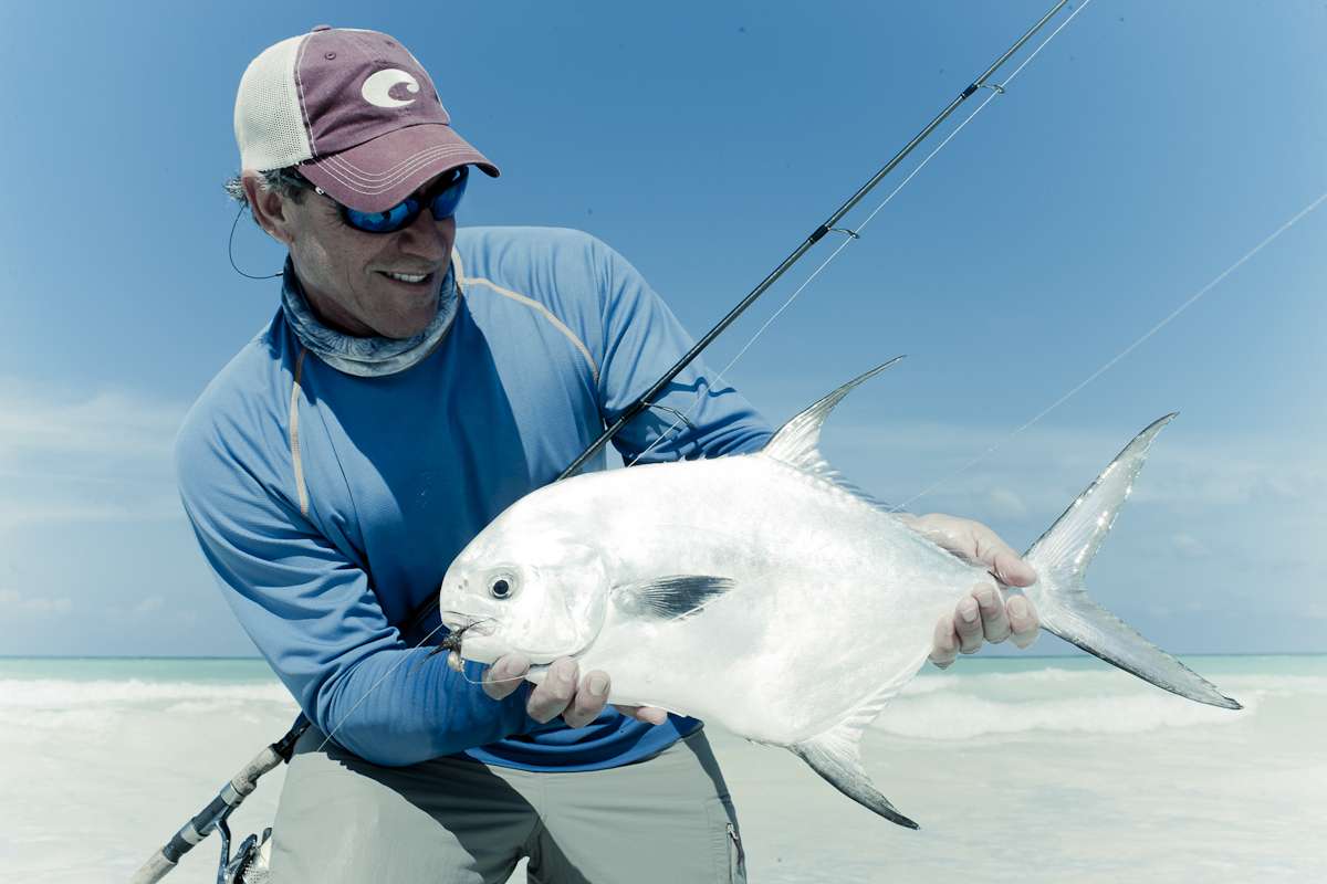 Jose Wejebe holding a fish