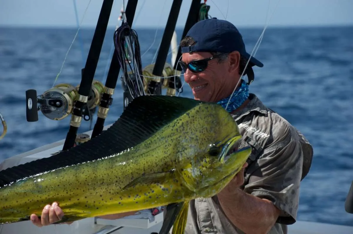 Jose holding a fish